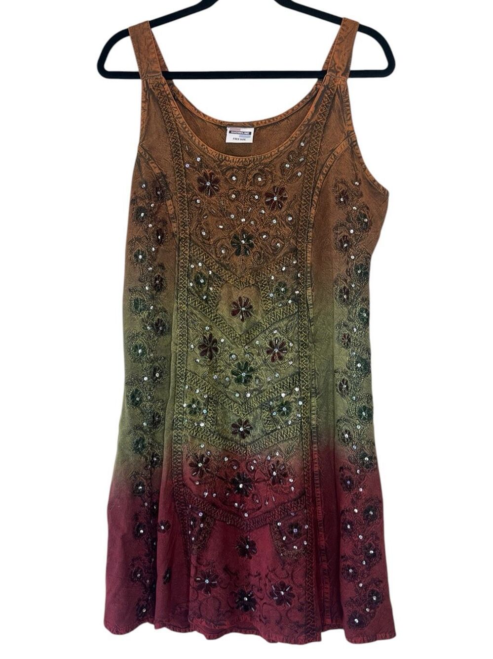 Flowy sleeveless bohemian ombre dress detailed with intricate beaded floral embr